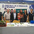 Equipo del stand de la Facultad CFCN junto al Director de Escuela Alejandro Bozo y el rector Ennio Vivaldi.